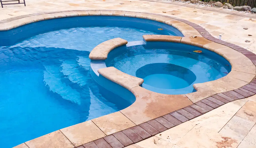 The Allure fiberglass inground pool by Leisure Pools